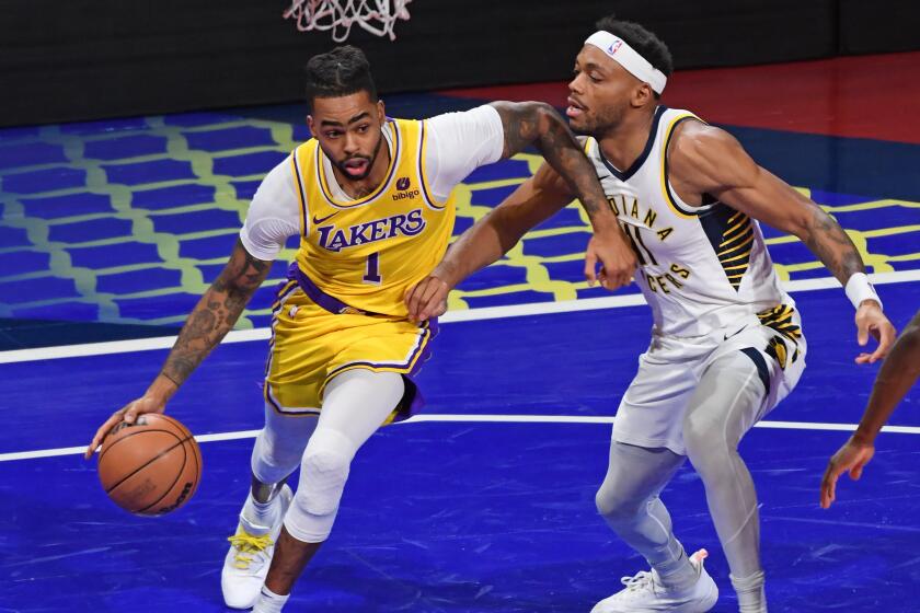 LAS VEGAS, NV - DECEMBER 9: D'Angelo Russell #1 of the Los Angeles Lakers dribbles.