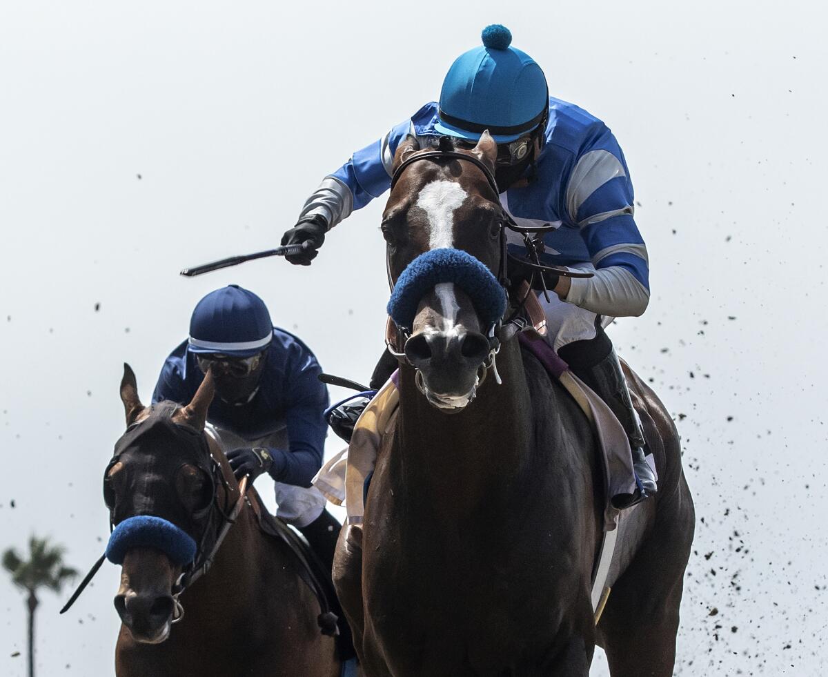 Thousand Words, right, with Abel Cedillo aboard, wins the Shared Belief Stakes on Aug. 1, 2020, at Del Mar.