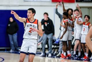 Senior guard Mateo Trujillo of Rolling Hills Prep points to the crowd after making three against Oaks Christian.