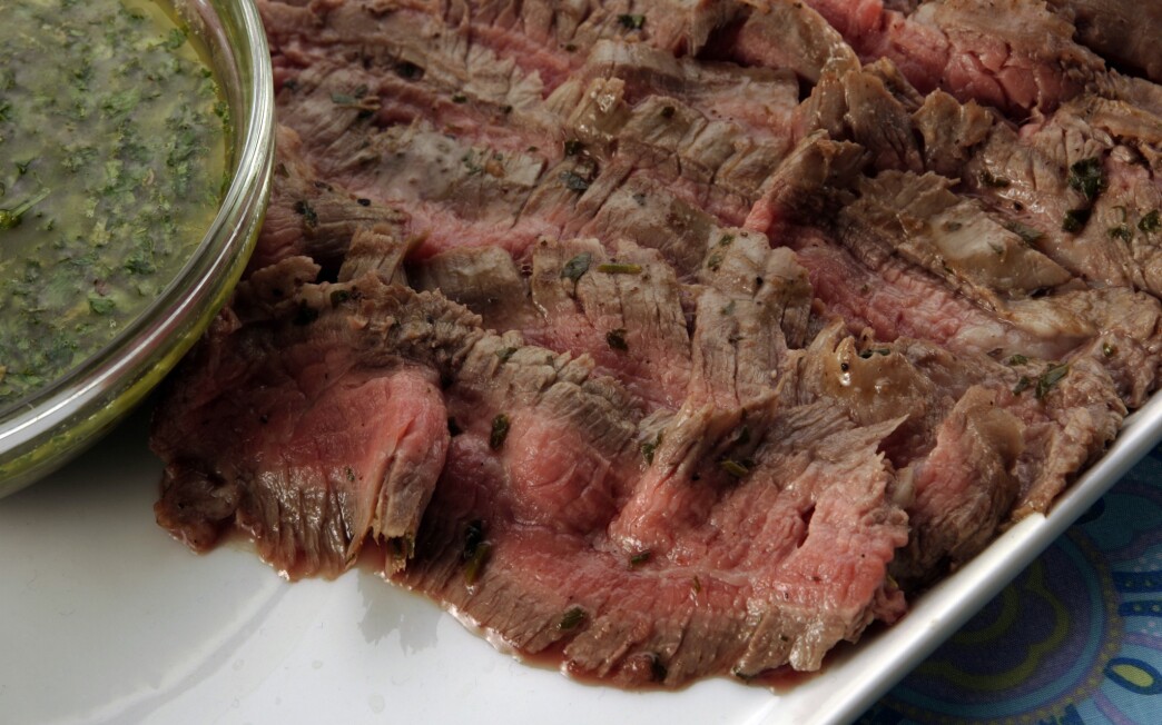 Grilled flank steaks with chimichurri sauce