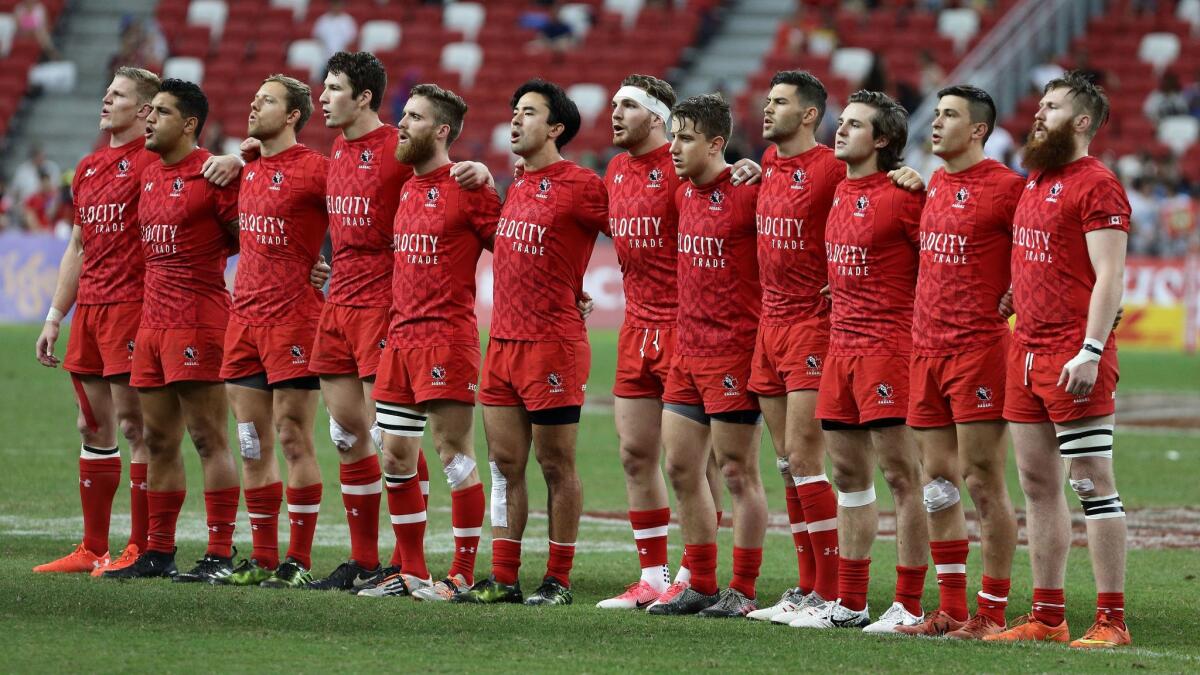 Team Canada sings the national anthem during the Cup Final 2017 Singapore Sevens match between USA and Canada. (Suhaimi Abdullah / Getty Images)