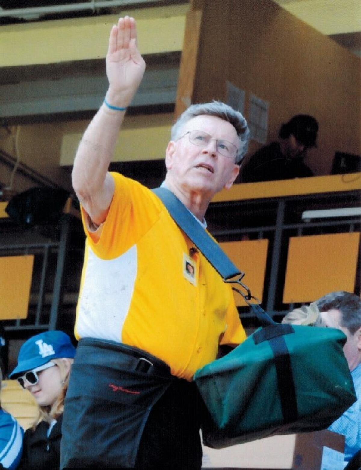 Roger Owens interacts with fans at Dodger Stadium.