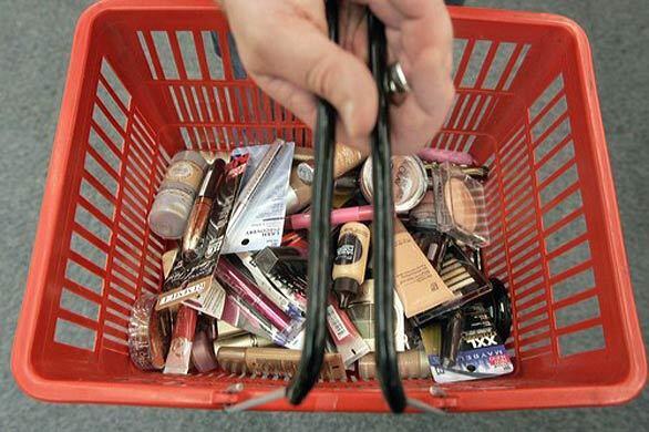 By Melissa Magsaysay, Los Angeles Times staff writer The contents of a woman's makeup bag can say as much about her as the shoes that line her closet. A shiny black Chanel eye shadow palette has the same sleek appeal as a sexy pair of Jimmy Choo stilettos, and the gilded exterior of a YSL Touche Éclat concealer pen oozes the same sense of luxury as a pair of satin Louboutins. These days, though, such luxe touches are increasingly commingled with products that proudly telegraph "value" and "I don't need to pay more." The same "high-low" impulse that has women comfortably mixing J.Crew with those Jimmy Choos is working its way into their makeup routines, replacing some department store buys with mascaras and lipsticks found at the drugstore. Melissa Magsaysay and makeup artist Craig Beaglehole went to a drugstore to hunt for the best cosmetics they could find there. At left, Beaglehole holds a CVS shopping basket containing products that he tested.