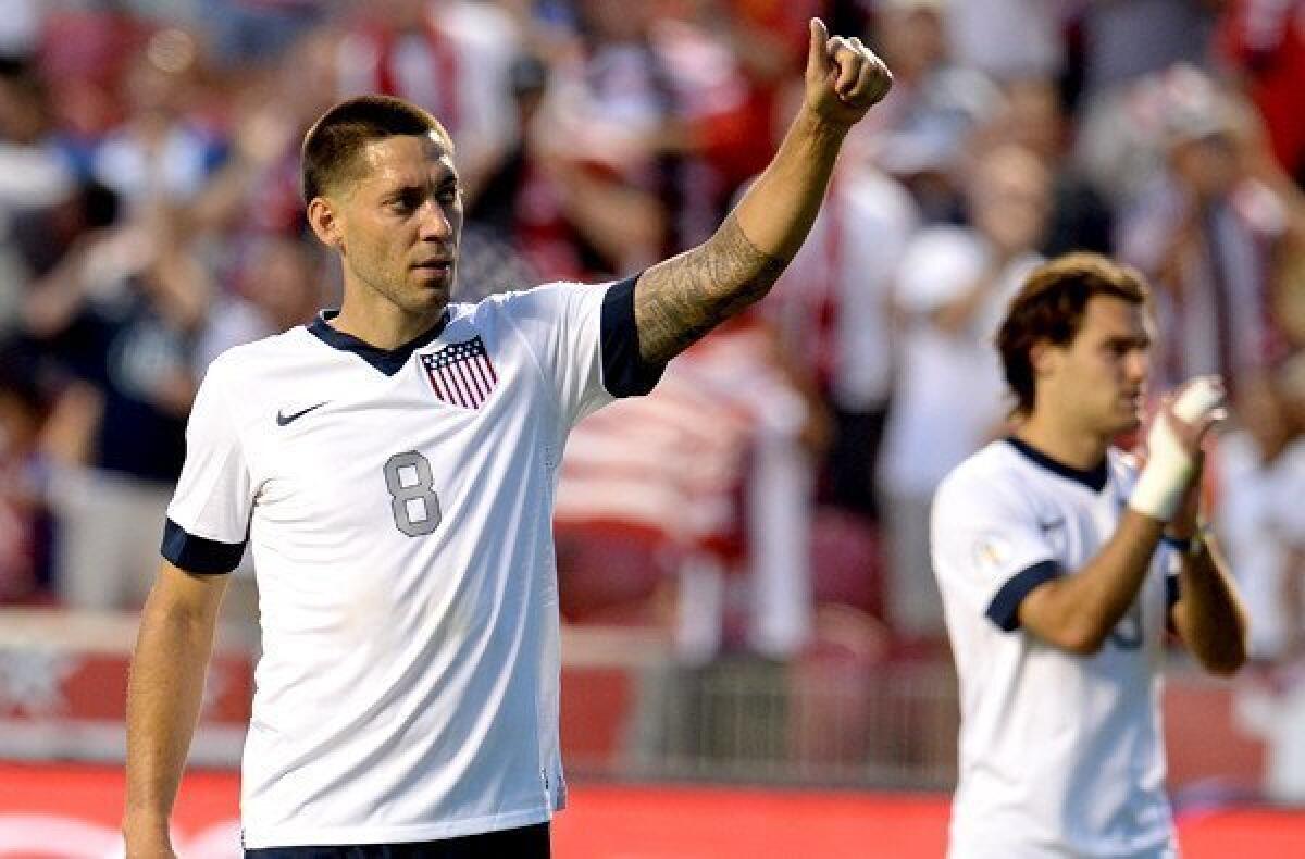 Clint Dempsey gives the thumbs-up to fans after the U.S. defeated Honduras, 1-0, in a World Cup qualifying game in Utah on June 18.