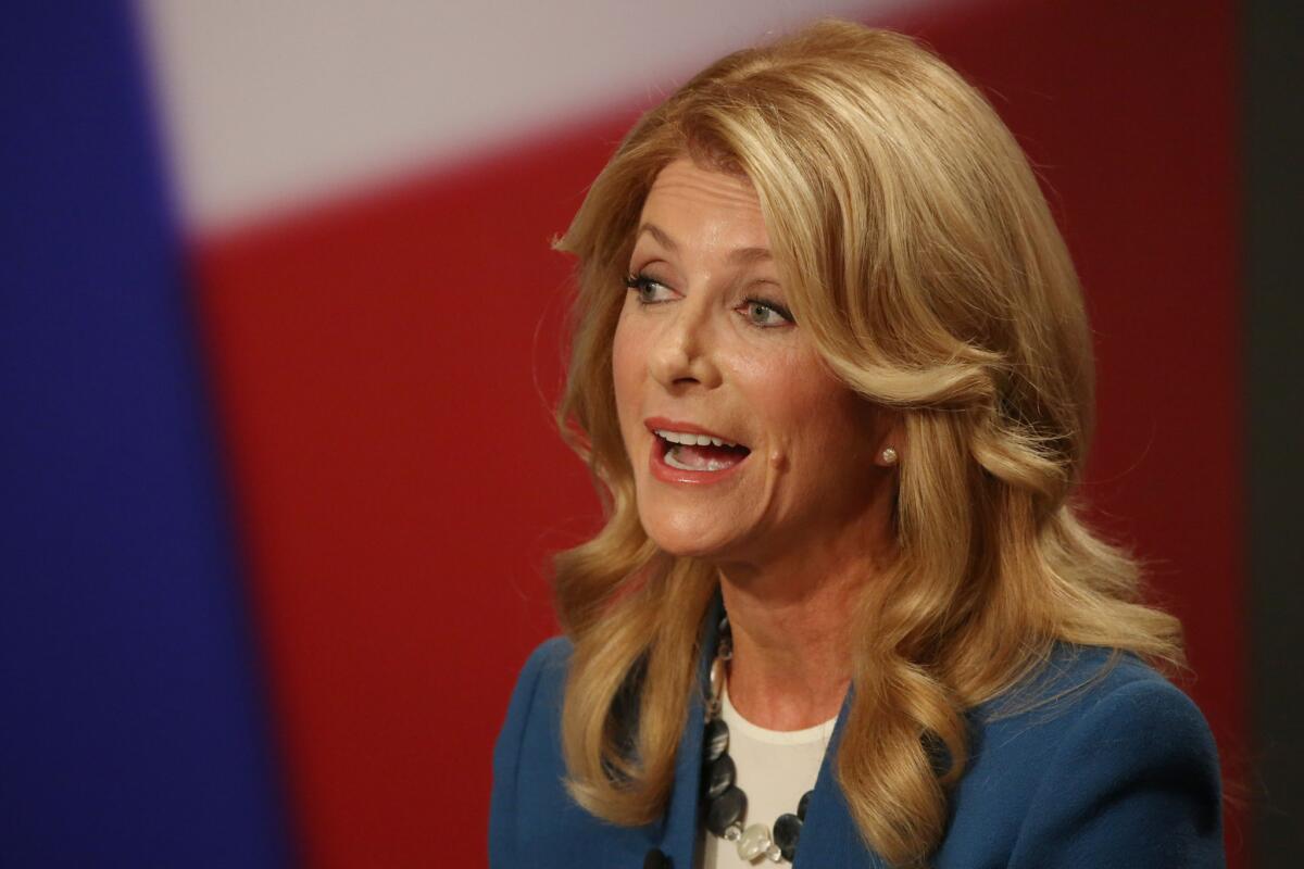Wendy Davis defended a controversial TV spot criticizing her paraplegic opponent, saying the ad featuring a wheelchair was about his alleged hypocrisy and not his disability.