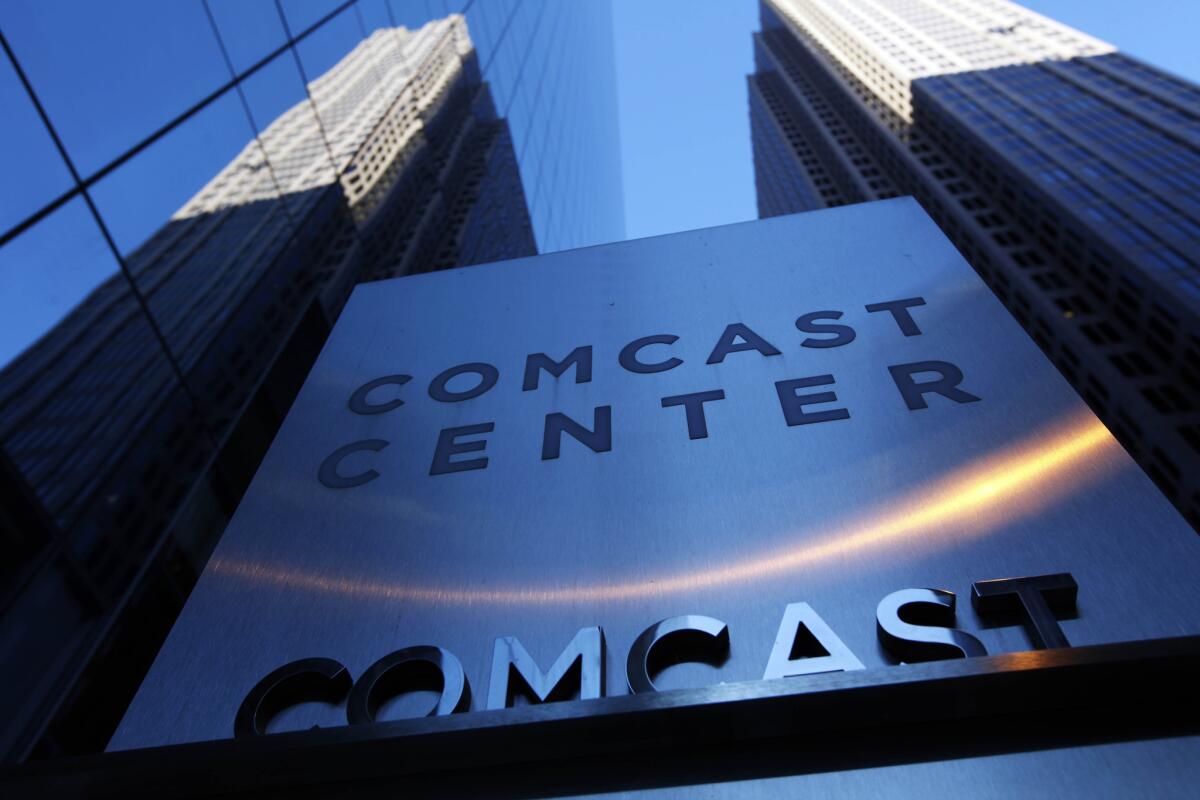An administrative law judge in California has recommended that the California Public Utilities Commission approve Comcast's proposed takeover of Time Warner Cable. Pictured: Comcast headquarters in Philadelphia.