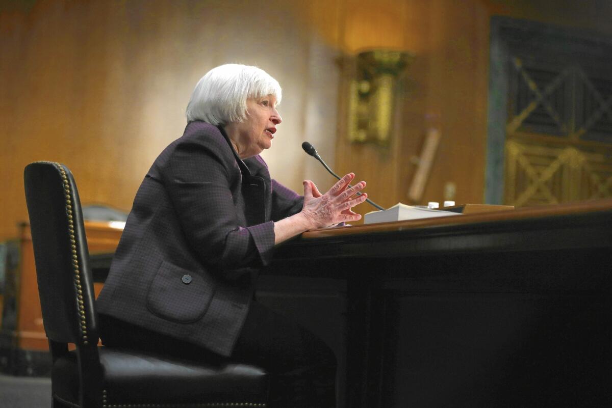 "Too many Americans remain unemployed or underemployed, wage growth is still sluggish, and inflation remains well below our longer-run objective,” Fed chief Janet L. Yellen said during a Senate hearing Tuesday.