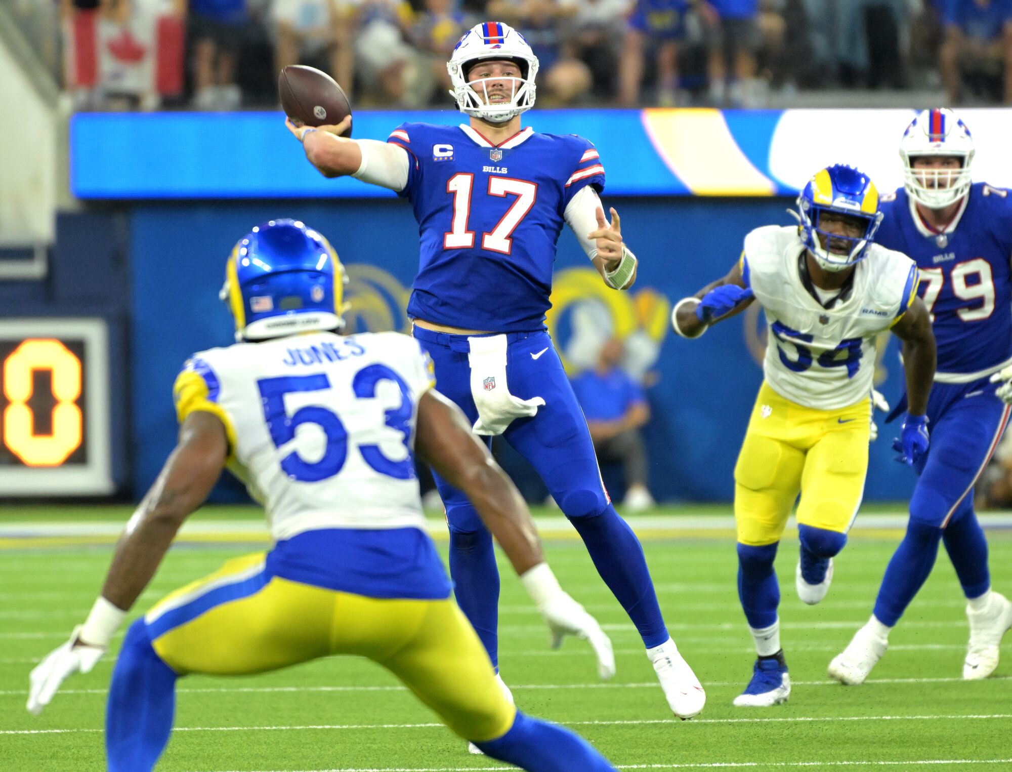 Bills quarterback Josh Allen throws a 53-yard touchdown against the Rams in the fourth quarter.
