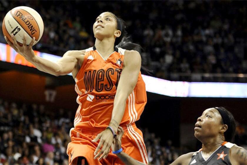 Candace Parker is averaging 18.1 points and 9.2 rebounds per game for the Sparks this season.