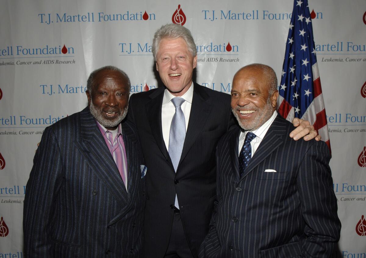 Clarence Avant, Bill Clinton and Berry Gordy at the T.J. Martell Foundation's 31st Annual Awards Gala at in New York City.
