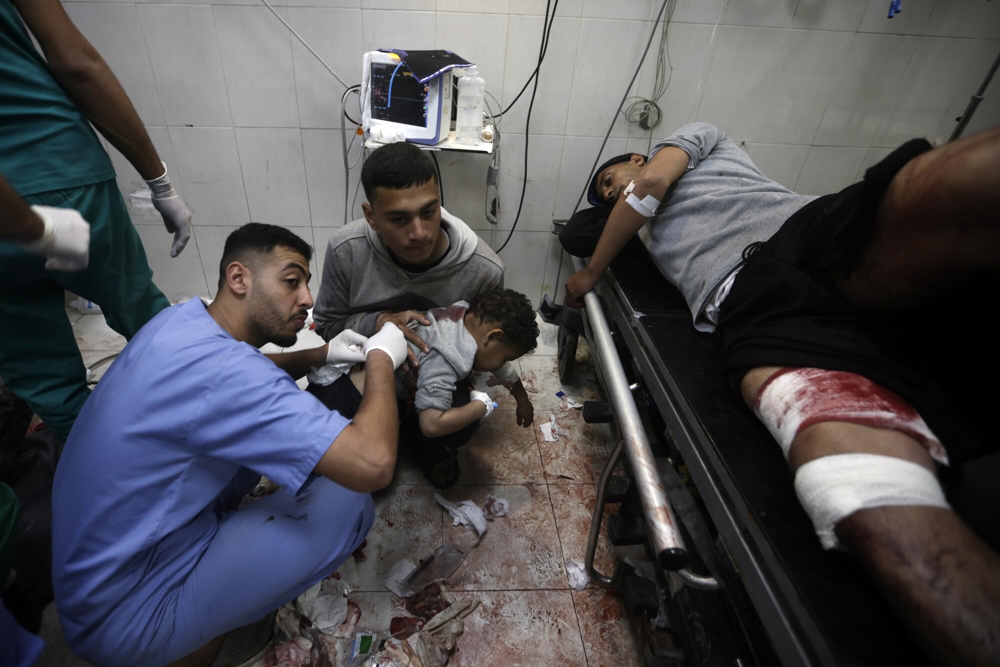 Wounded Gazans at a hospital in Khan Yunis