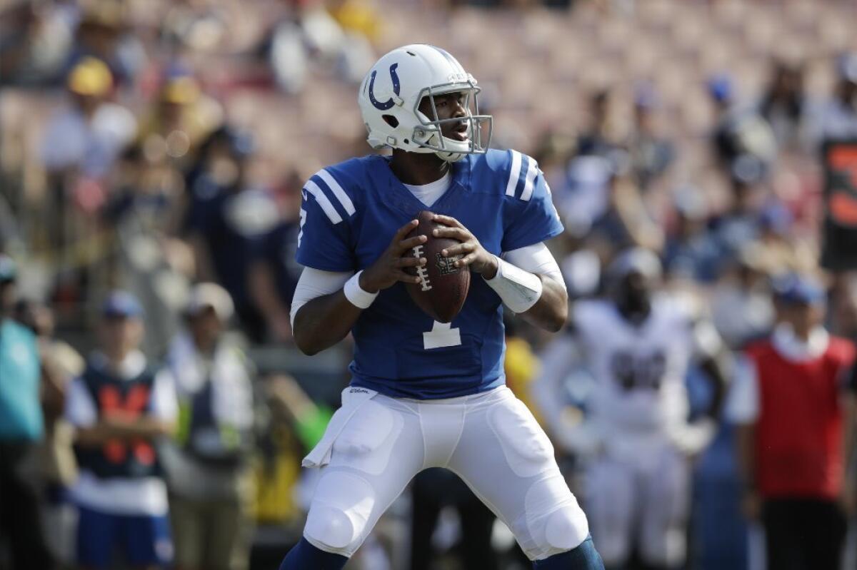 Colts quarterback Jacoby Brissett looks to pass during the second half of a game against the Rams at the Coliseum on Sept. 10.