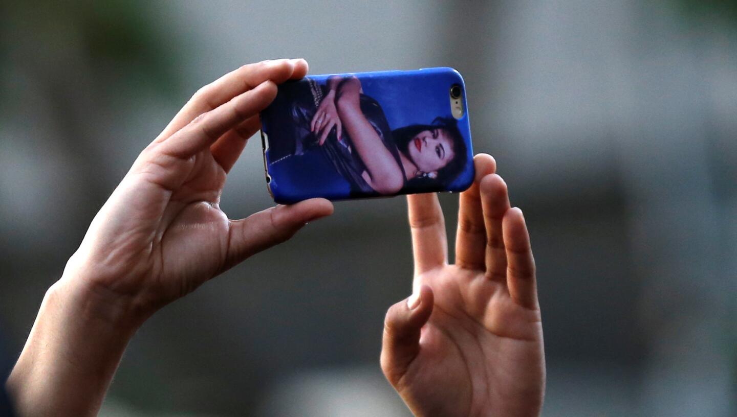 A mobile phone case depicting late singer Selena Quintanilla-Perez is pictured at the ceremony for the unveiling of her star on the Hollywood Walk of Fame in Los Angeles