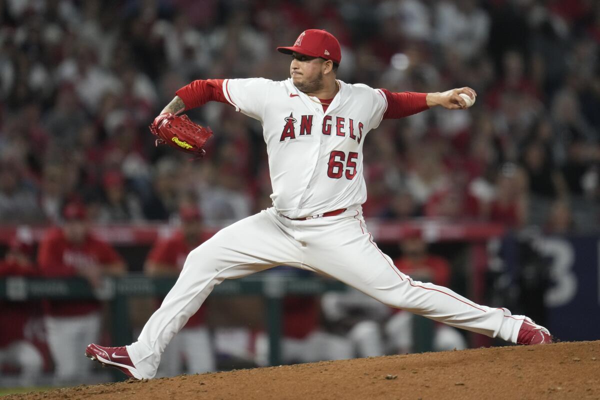 Angels relief pitcher José Quijada delivers during the fifth inning of an 11-8 loss to the Kansas City Royals.