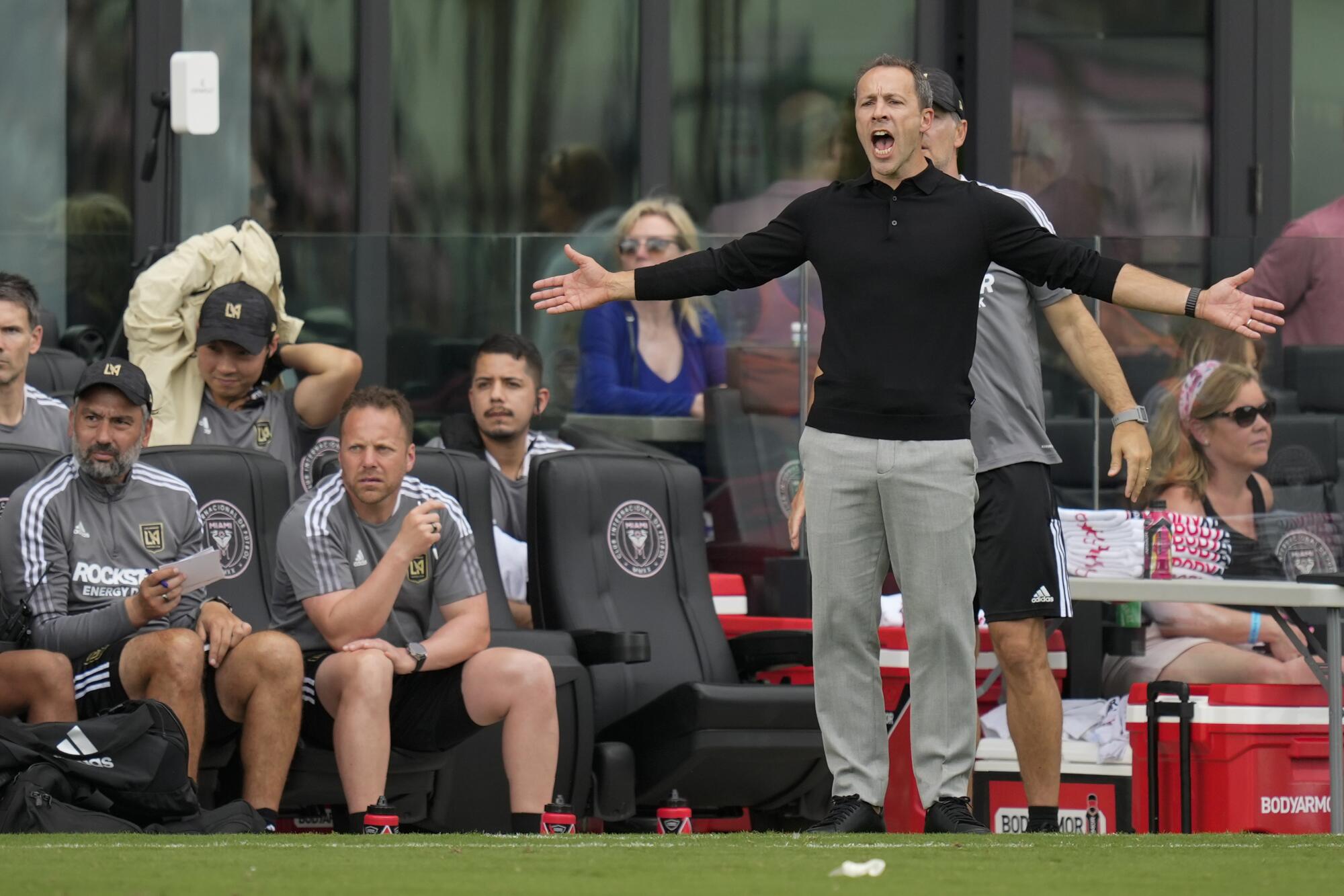LAFC coach Steve Cherundolo shouts to his players from the sidelines during a 2022 match against Inter Miami.