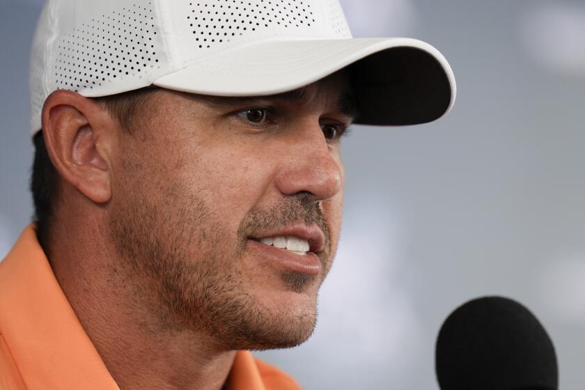 Brooks Koepka speaks during a news conference at the PGA Championship golf tournament at the Valhalla Golf Club, Wednesday, May 15, 2024, in Louisville, Ky. (AP Photo/Jeff Roberson)