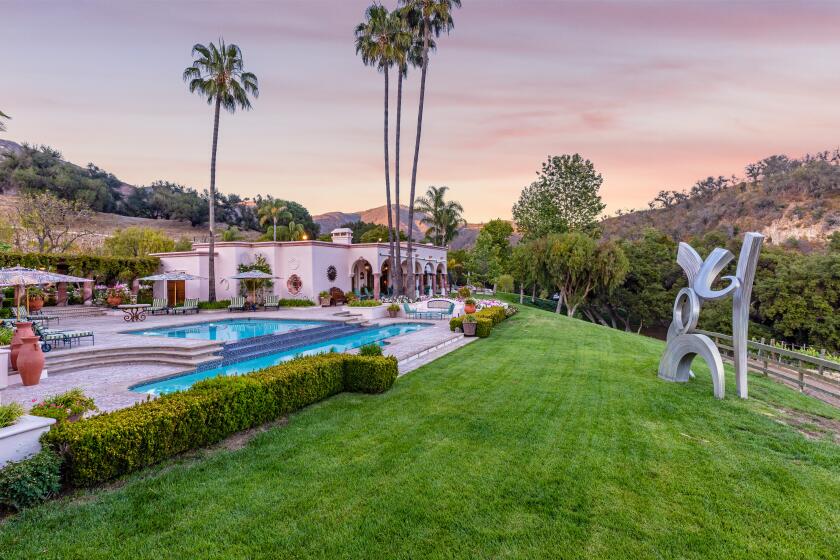 The 180-acre compound includes a 12,000-square-foot home, three guesthouses, two pools and a 10,000-vine vineyard.