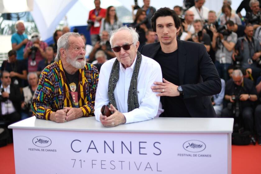 (FromL) British-US director Terry Gilliam, British actor Jonathan Pryce and US actor Adam Driver pose on May 19, 2018 during a photocall for the film "The Man Who Killed Don Quixote" at the 71st edition of the Cannes Film Festival in Cannes, southern France. / AFP PHOTO / LOIC VENANCELOIC VENANCE/AFP/Getty Images ** OUTS - ELSENT, FPG, CM - OUTS * NM, PH, VA if sourced by CT, LA or MoD **