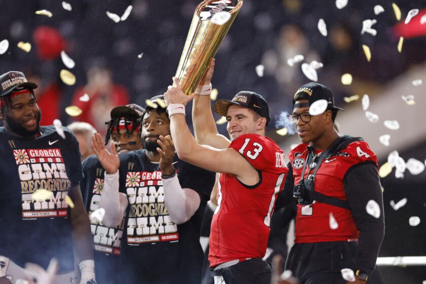Inglewood, CA - January 9: Georgia quarterback Stetson Bennett celebrates after beating TCU in the College Football Playoff National Championship on January 9, 2023 in Inglewood, CA. (K.C. Alfred / The San Diego Union-Tribune)