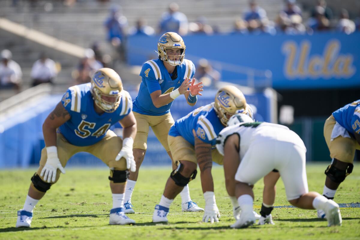 UCLA quarterback Ethan Garbers waits for the ball to be snapped 