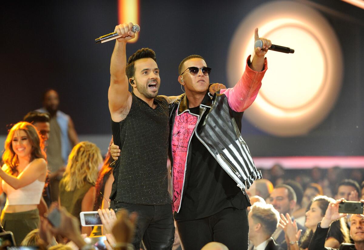 Luis Fonsi, left, and Daddy Yankee.