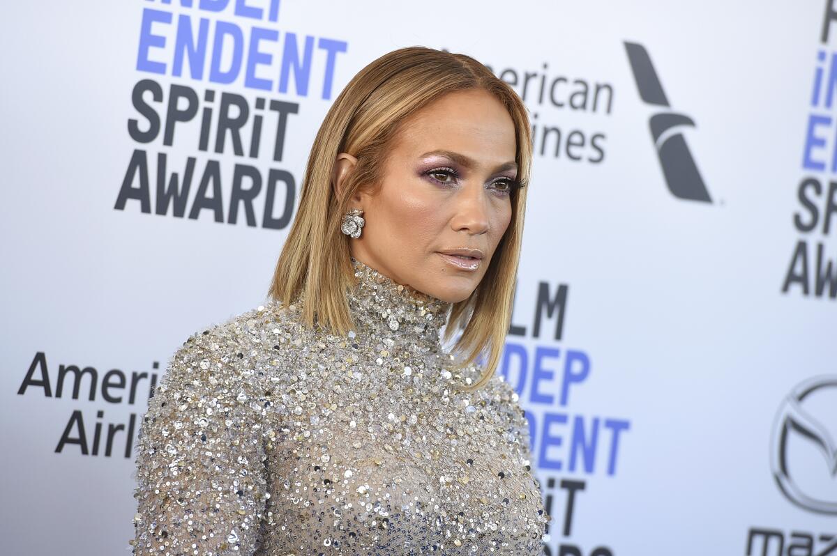 Jennifer Lopez in a beaded silver dress