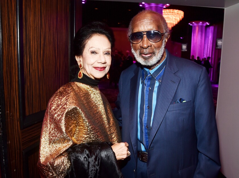Jacqueline and Clarence Avant participate in a gala before the Grammy Awards in January 2020.