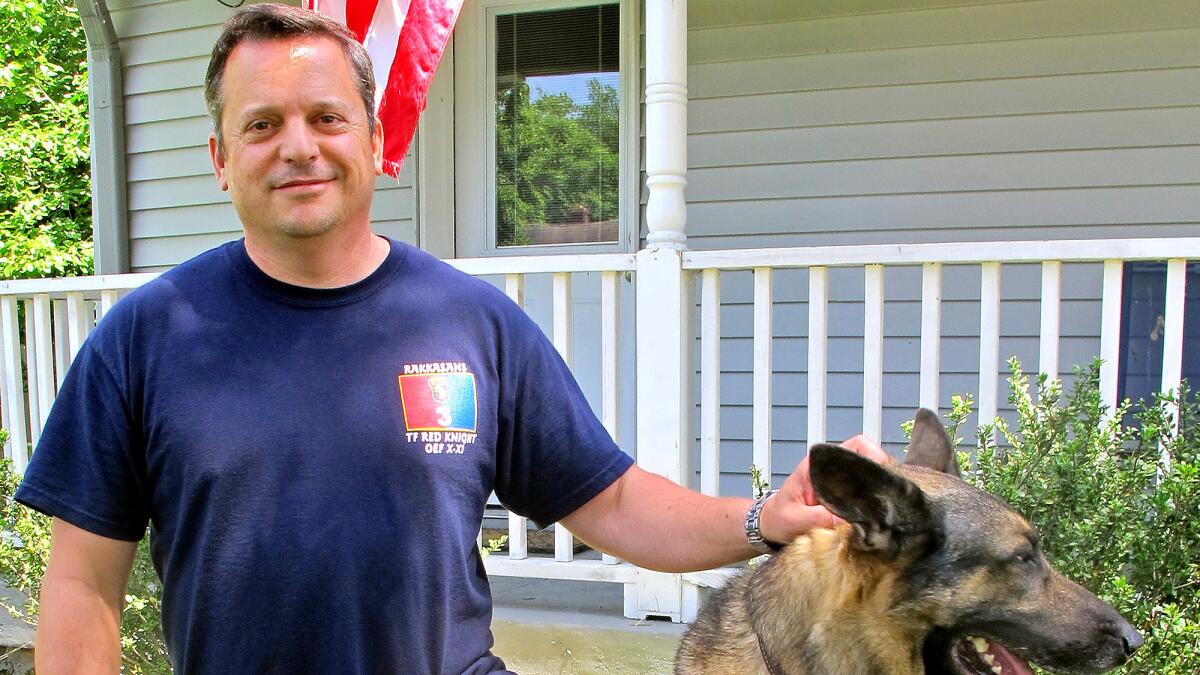 Douglas Pearce outside his home in Nashville. The Army veteran, a therapist in training, wants to help others overcome the type of combat demons he suffered with after serving in Afghanistan.