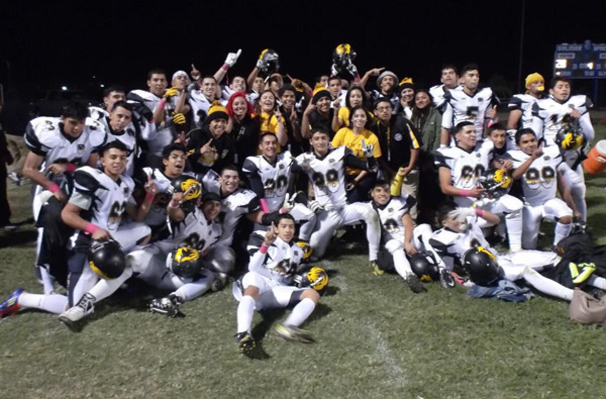 San Fernando High players celebrate after defeating Sylmar on Friday night.