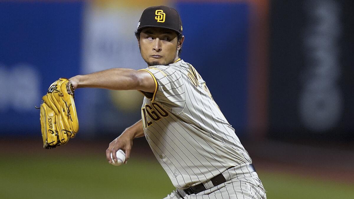 San Diego Padres starting pitcher Yu Darvish delivers against the New York Mets on Friday.
