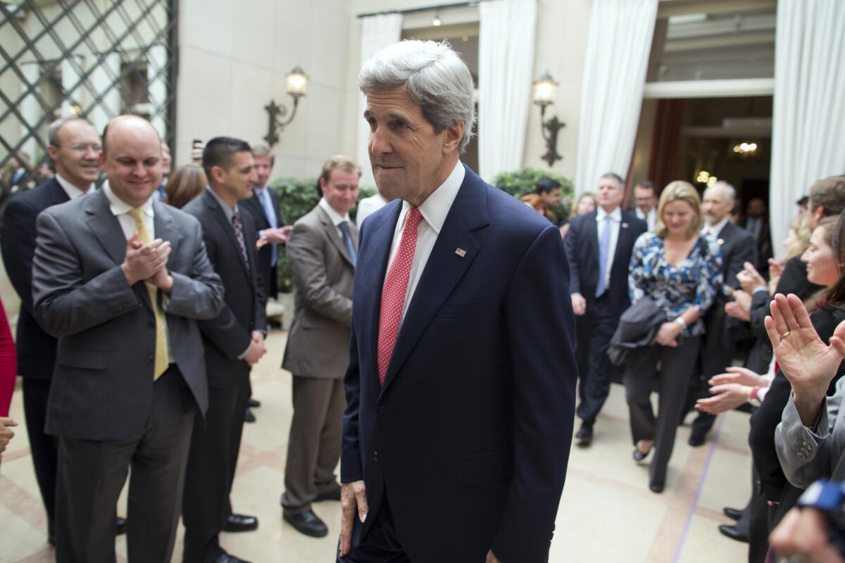 Secretary of State John F. Kerry arrives at the residence of Howard Gutman, U.S. ambassador to Belgium, in Brussels.