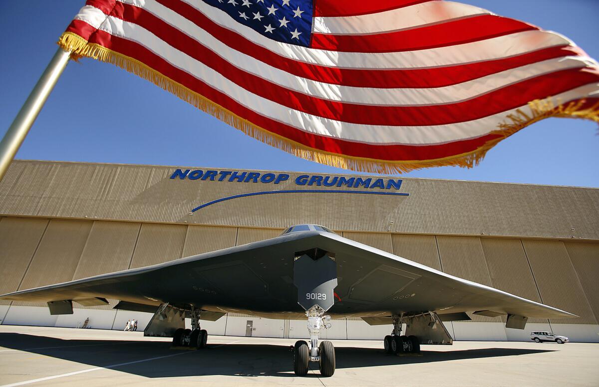 A B-2 Spirit Stealth bomber taxis to the runway at the Northrop Grumman Corp. facility in Palmdale in 2014. Northrop will build 80 to 100 new strategic bombers over the next decade.