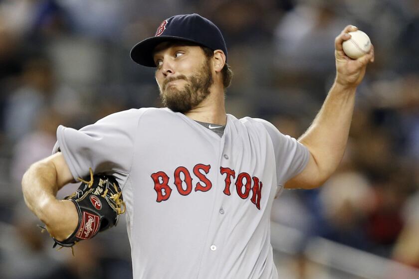 Red Sox starting pitcher Wade Miley delivers in the first inning against the Yankees. Miley was acquired by the Mariners in a four-player deal.