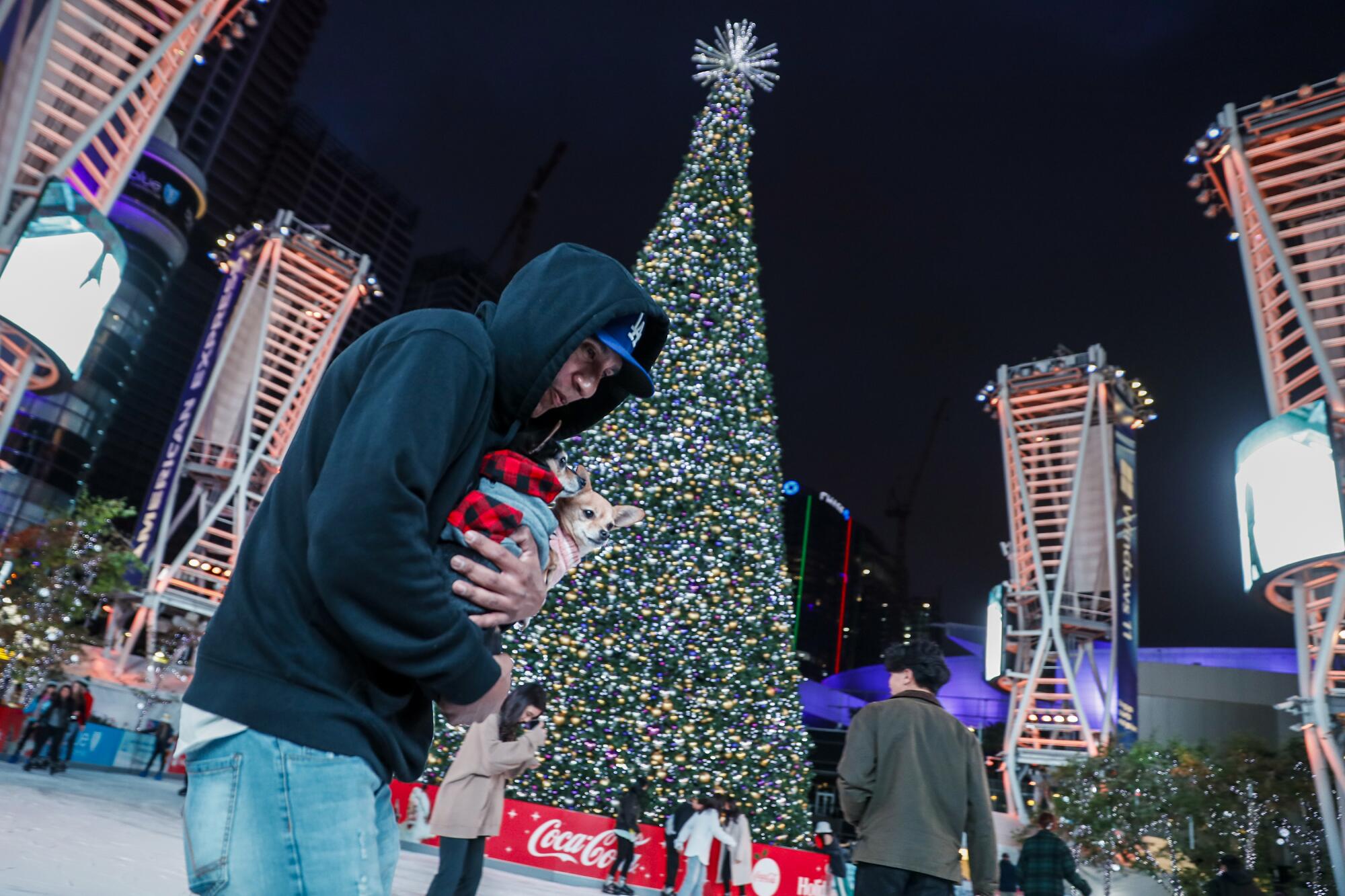 People ice skate at L.A. Live in downtown Los Angeles.