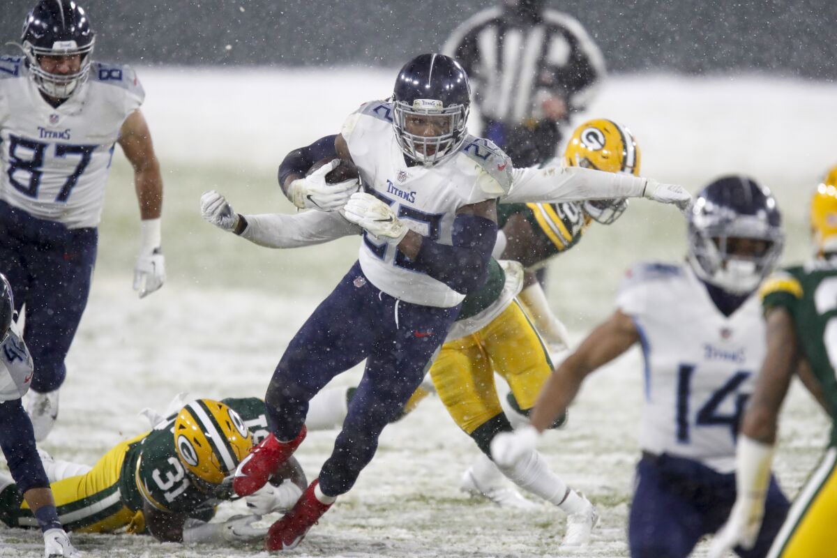 Tennessee Titans running back Derrick Henry carries the ball against the Green Bay Packers on Dec. 27.