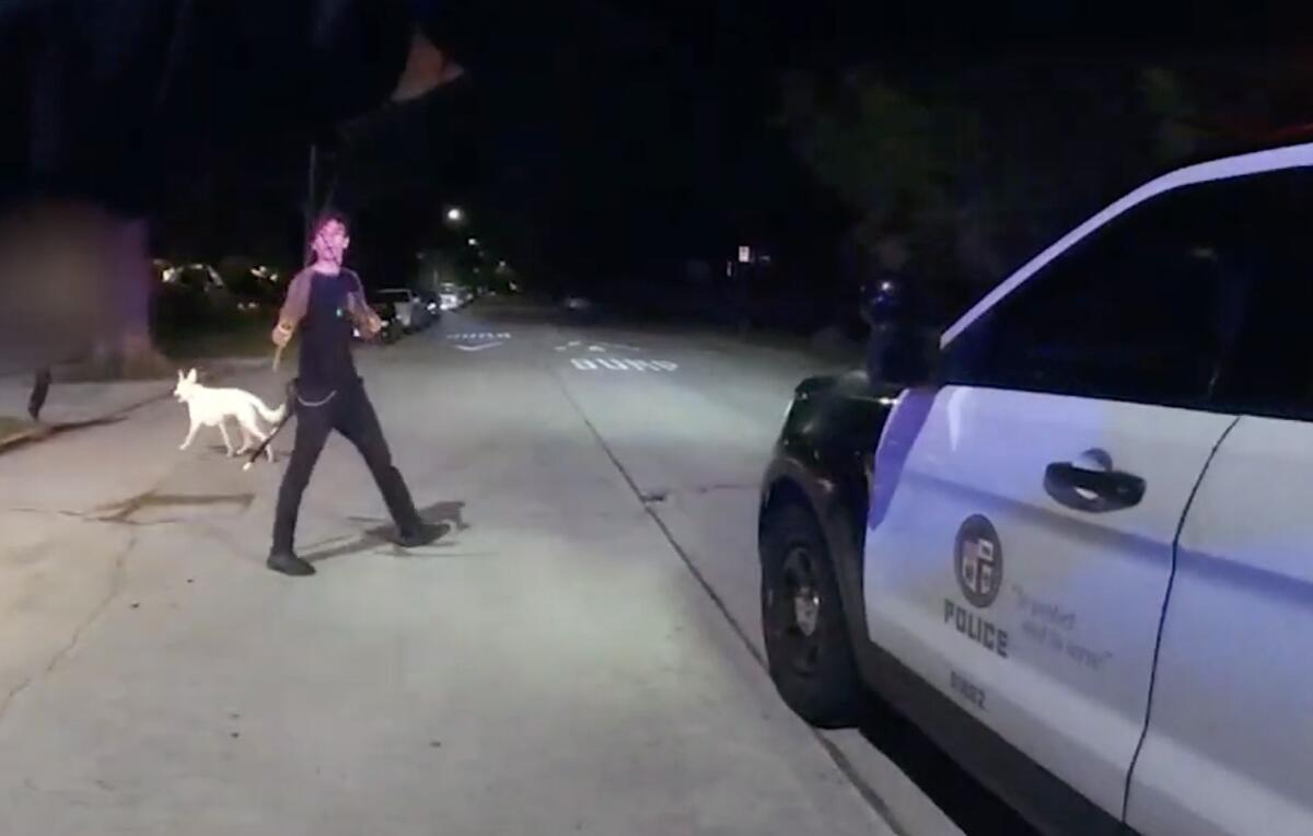 LAPD body cam footage shows officers engaging with man holding a sword in the Mid-Wilshire area of Los Angeles on Oct. 19.