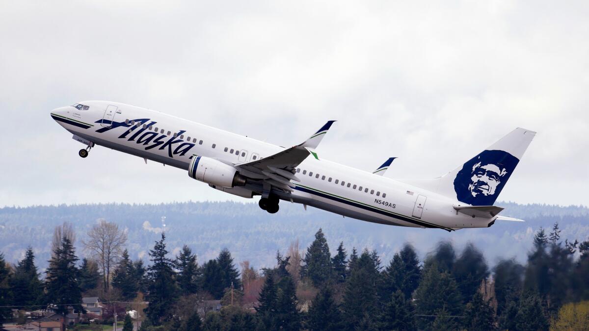 An Alaska Airlines jet takes off at Seattle-Tacoma International Airport.