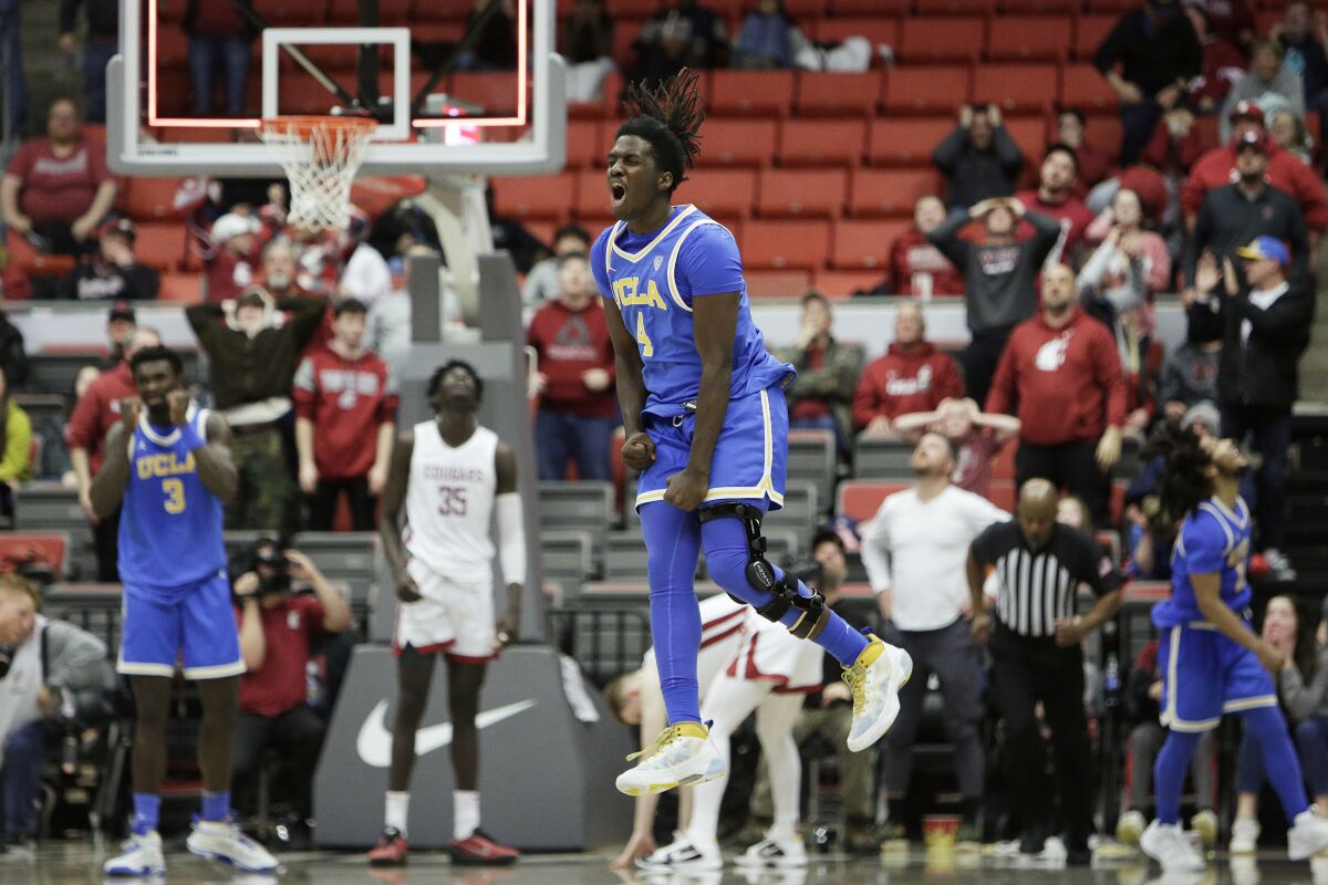 UCLA guard Will McClendon celebrates immediately after the Bruins' 67-66 win over Washington State on Friday.