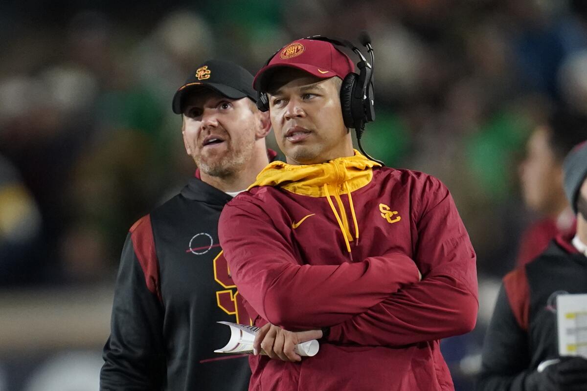 USC interim coach Donte Williams watches from the sideline during a loss to Notre Dame on Oct. 23.