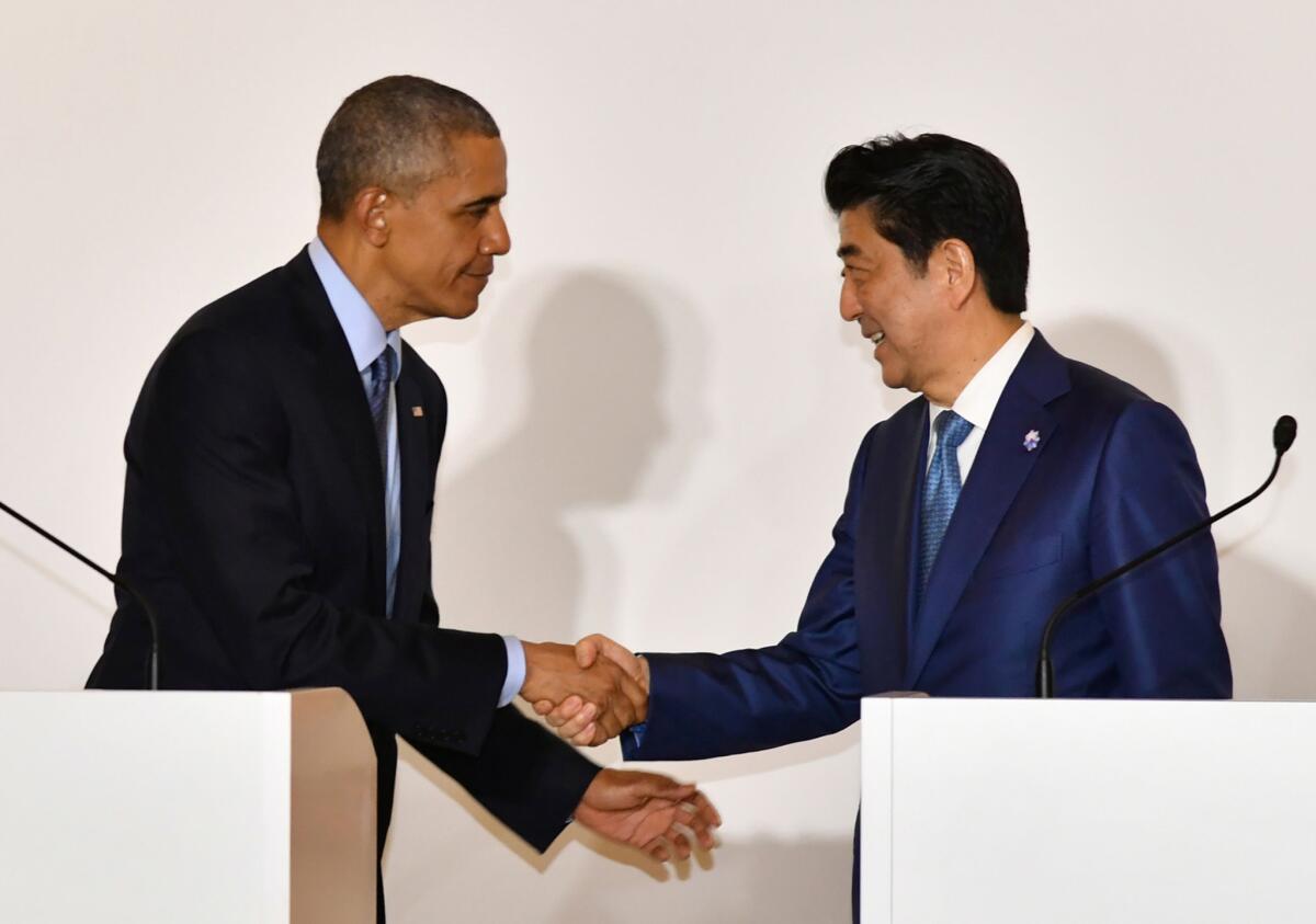 President Obama and Japanese Prime Minister Shinzo Abe in Japan on Wednesday.