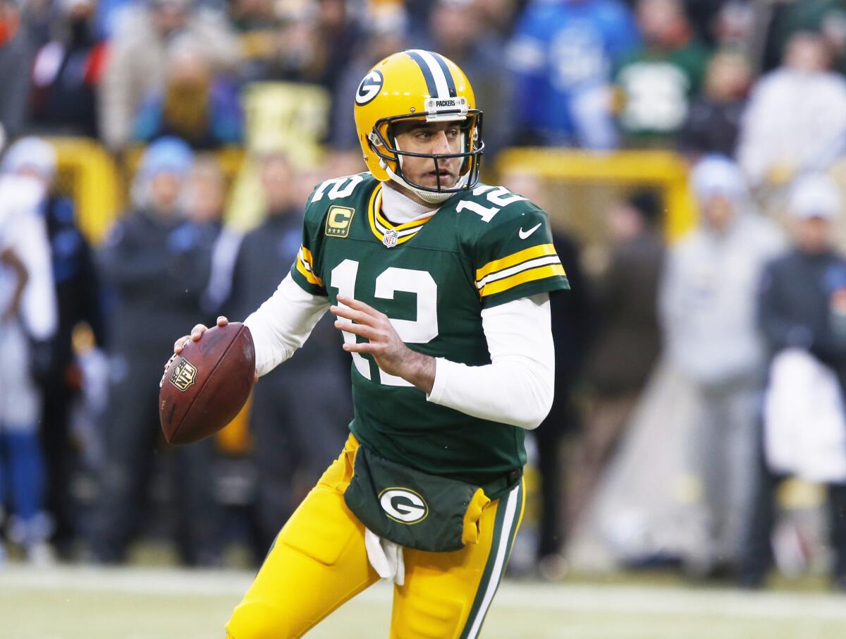 Green Bay Packers quarterback Aaron Rodgers looks to throw during a game against the Detroit Lions on Dec. 28.