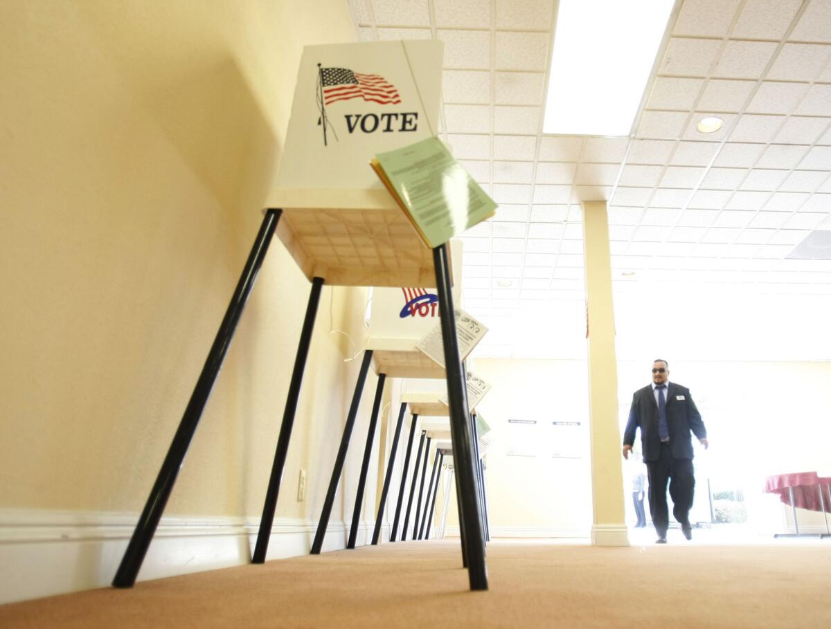 A 2009 file photo shows a polling station at the Stricklin/Snively Mortuary in Long Beach. California Secretary of State Alex Padilla's office is working to verify media reports that the information of as many as 191 million voters nationwide had been posted online “in an insecure manner by an unknown third party.”