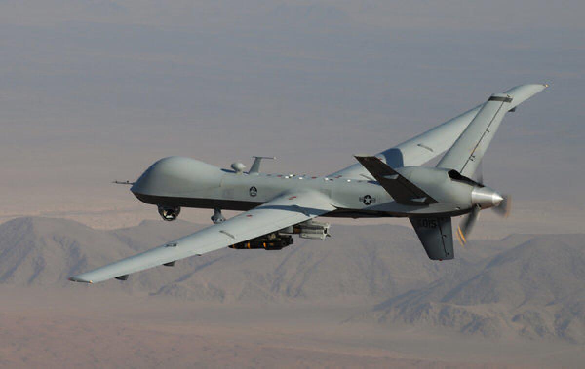 An MQ-9 Reaper, armed with laser-guided munitions and Hellfire missiles, during a combat mission over southern Afghanistan.