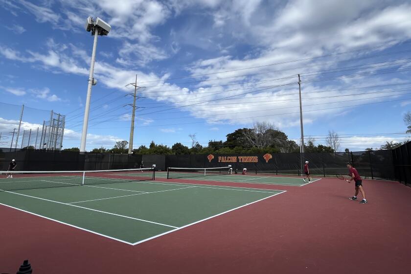 Robert Freedman plays on the new tennis courts at Torrey Pines.