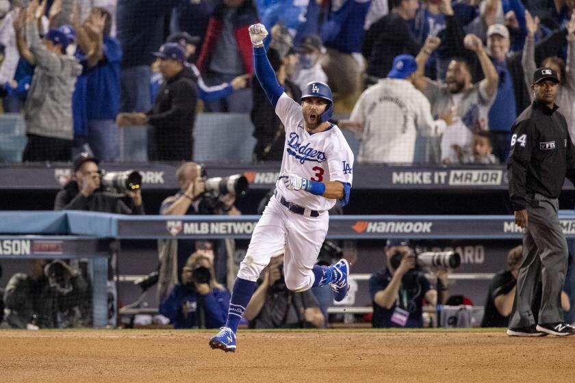 LOS ANGELES, CA - OCTOBER 6, 2021: Los Angeles Dodgers left fielder Chris Taylor (3) reacts while running.