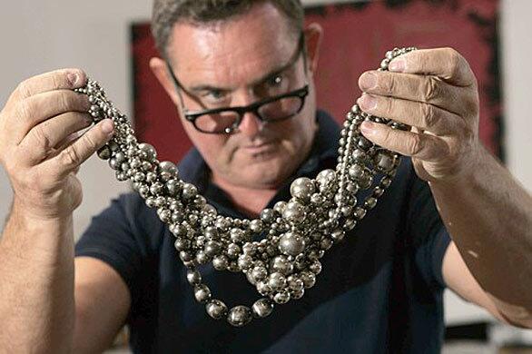 Tom Binns' Medusa Necklace, made of oxidized sterling silver beads.