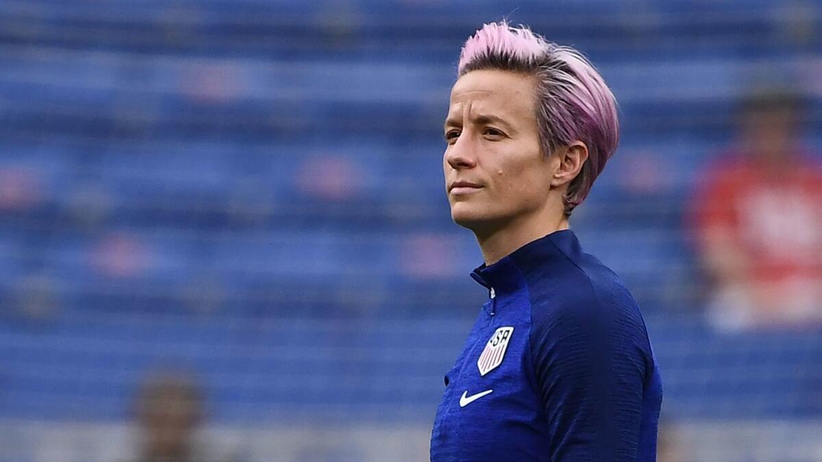 U.S. forward Megan Rapinoe walks on the pitch before Tuesday's Women's World Cup semifinal contest against England.