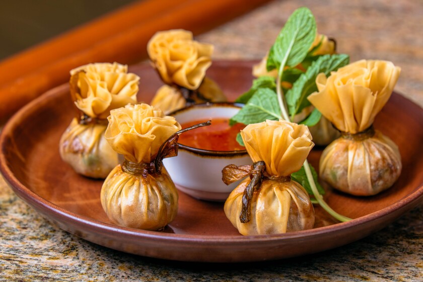 Thai Golden Bags With Sweet Chili Dipping Sauce makes an ideal family project that can involve young kitchen helpers.