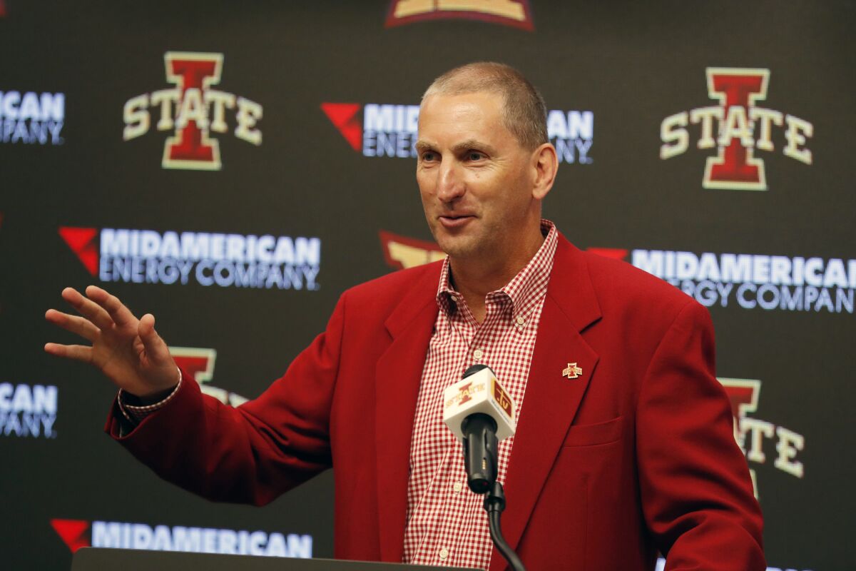 FILE - Iowa State Athletic Director Jamie Pollard speaks during an NCAA college football news conference, Aug. 1, 2018, in Ames, Iowa. Pollard announced in an open letter to Cyclones fans his diagnosis of testicular cancer. In the letter released Wednesday, Dec. 1, 2021, on the school’s website, Pollard said his diagnosis began with groin pain about four weeks ago. (AP Photo/Charlie Neibergall, File)