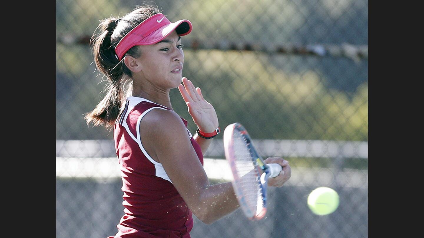 La Canada's Sophie McKenzie hits a forehand return in the finals against San Marino in the Rio Hondo League girls' tennis semifinal at the Arcadia Tennis Center on Thursday, October 26, 2017. McKenzie won the Rio Hondo League title.
